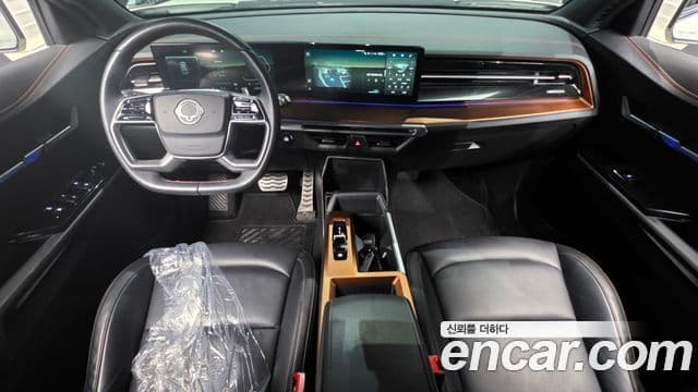 KG Mobility 토레스 EVX - Салон